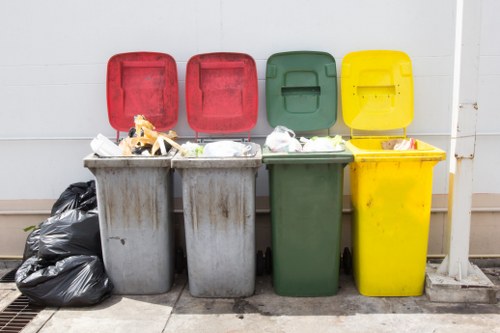 Waste removal trucks servicing Barons Court