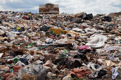 Eco-friendly waste removal vehicles in Chiswick